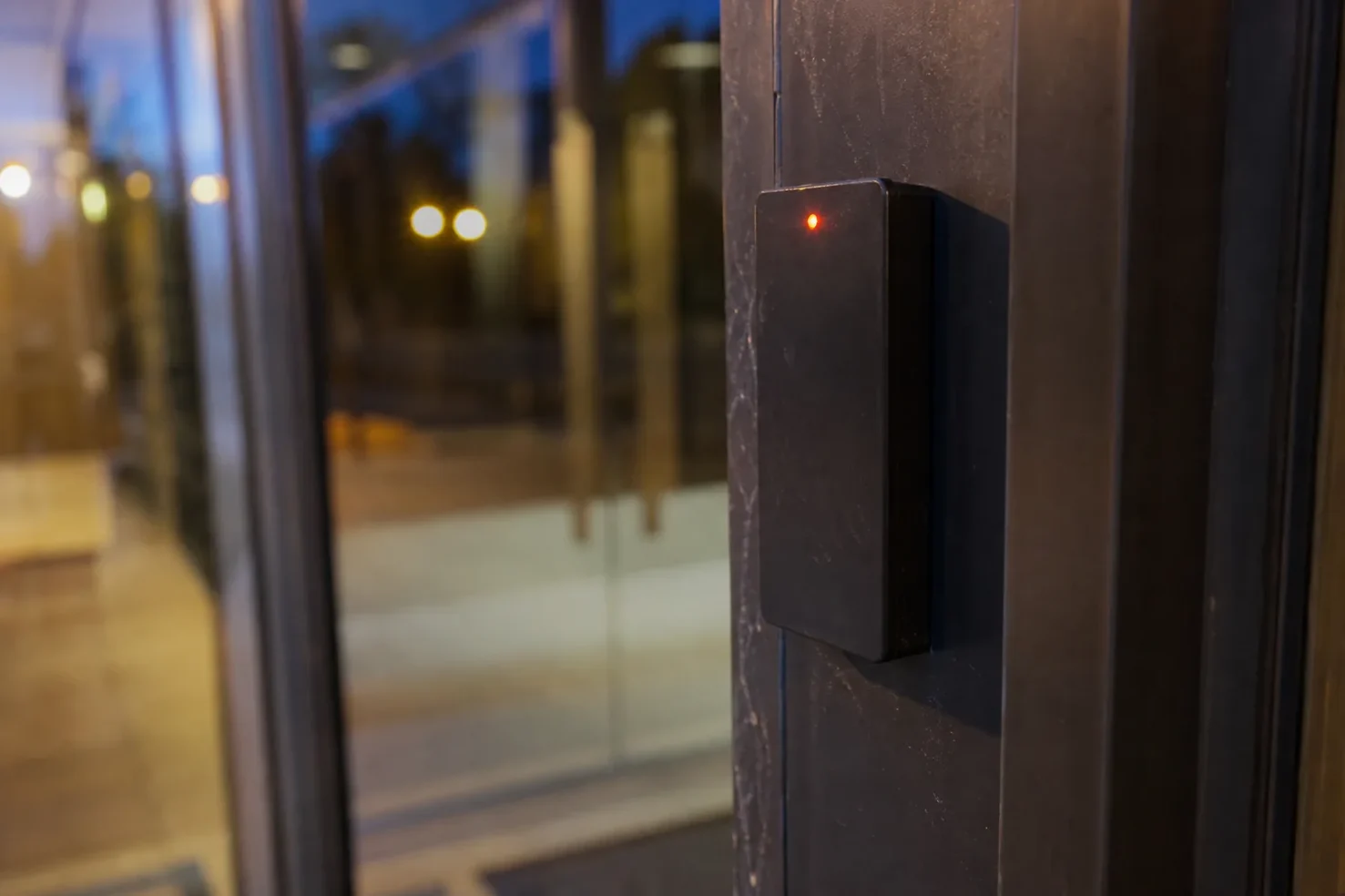 Access control card reader beside an office door in TX