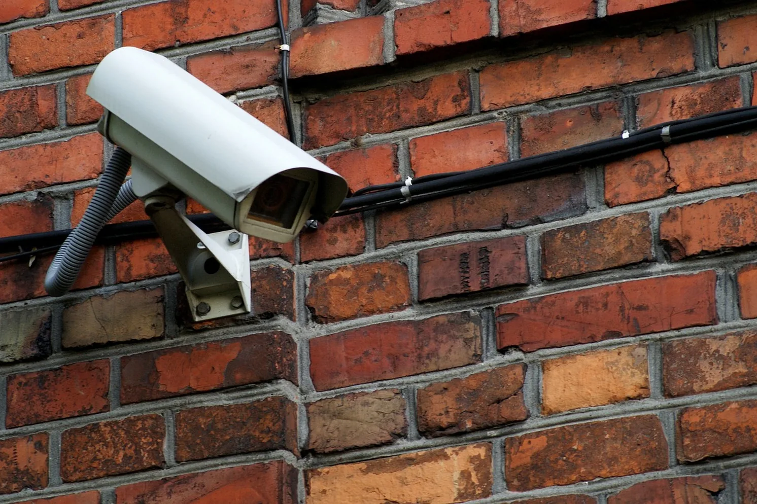 Security camera above a business entrance, TX